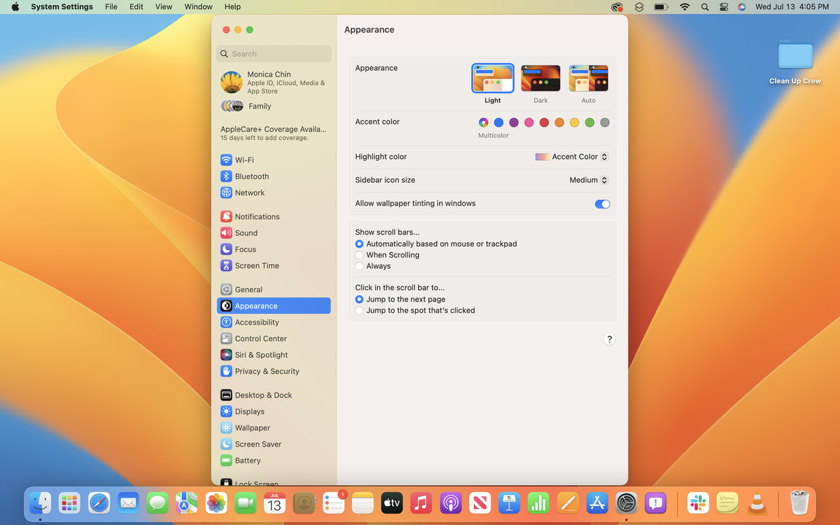 MacOS Ventura'da mavi ve turuncu masaüstü arka planında açılan Sistem Ayarları uygulamasının ekran görüntüsü.