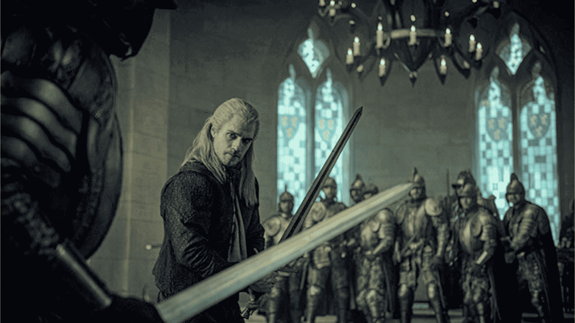 Geralt bir kalenin salonunda savaşmaya hazır bir kılıç tutuyor