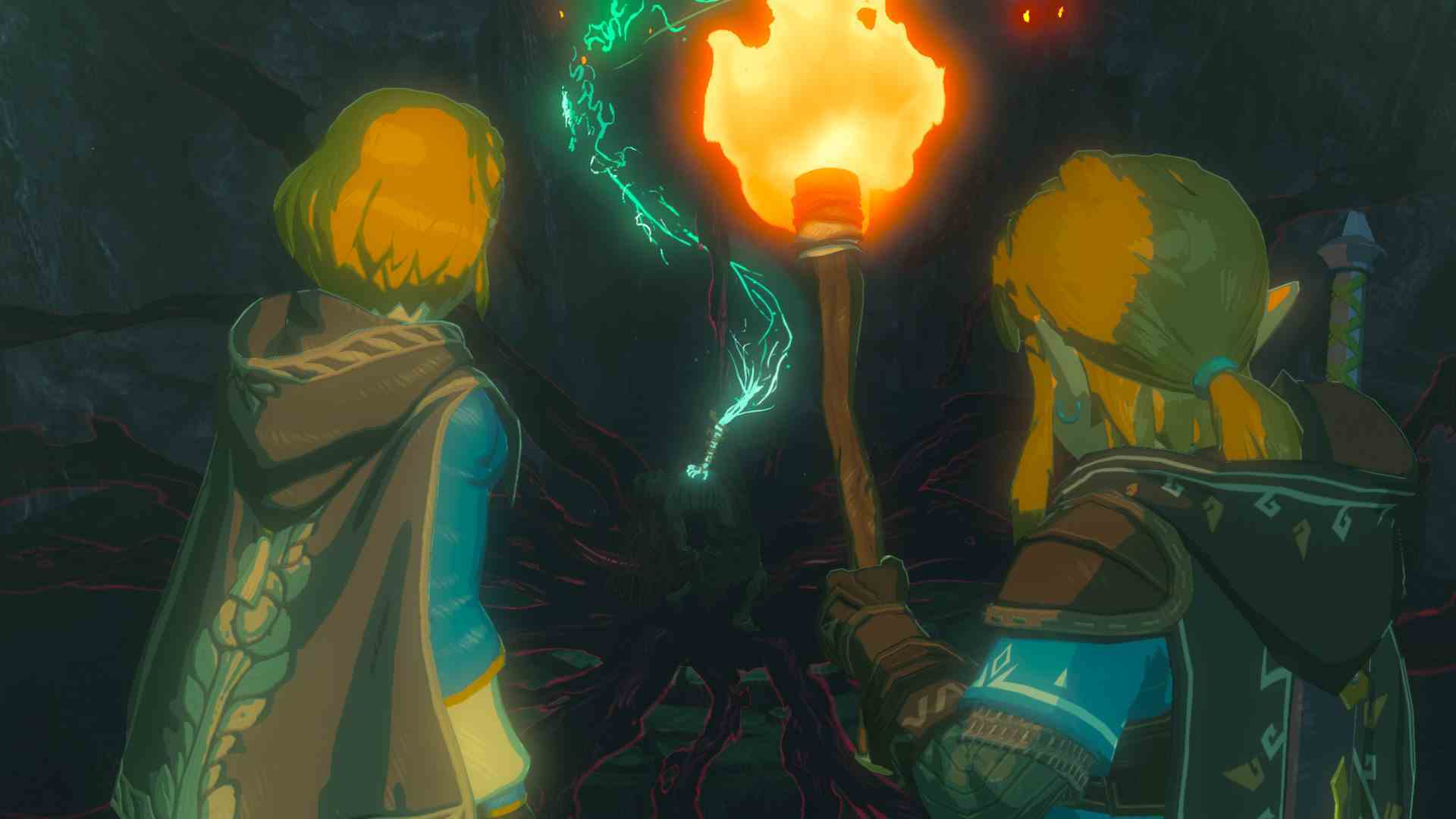 Bir meşale tutan Link ve Zelda karanlık bir geçide giriyor