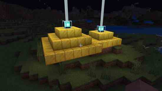 Minecraft işaretçisi - altın blokların üzerinde parlayan iki işaret.