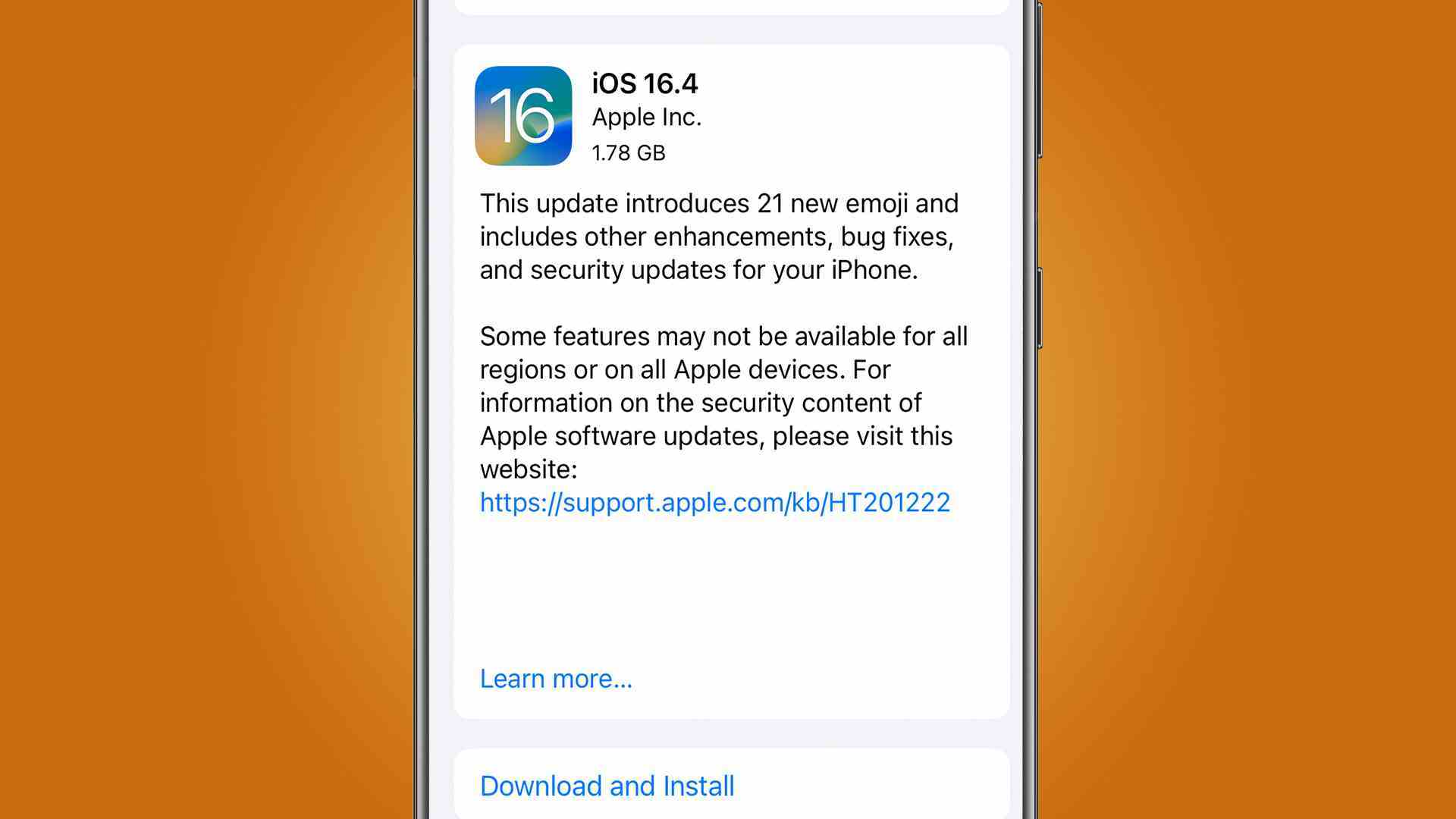Turuncu arka planda iOS 16.4 güncelleme ekranını gösteren bir iPhone