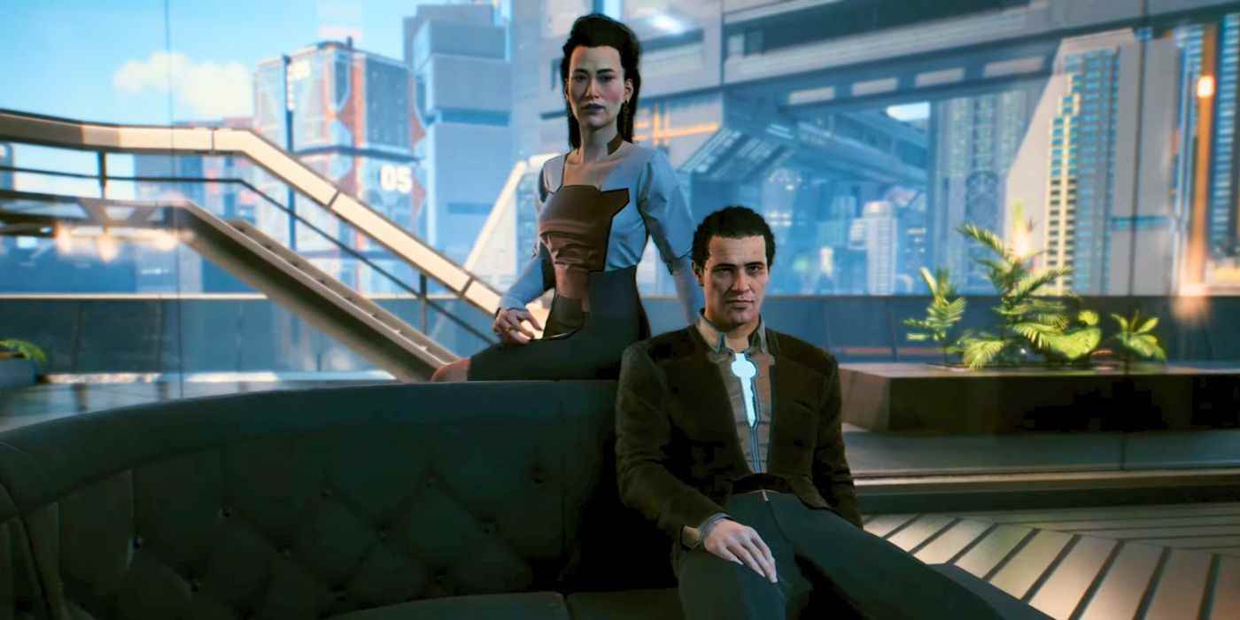 Bay ve Bayan Peralez, Cyberpunk 2077'de kanepelerinde oturmuş V ile konuşuyorlar.