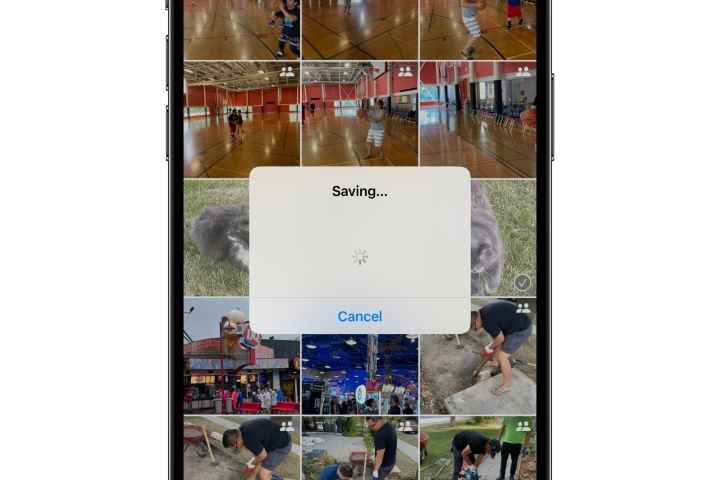 iPhone, Live Photo'yu video ilerleme iletişim kutusu olarak kaydetmeyi gösteriyor.